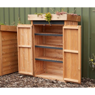 Armoire en bois avec toit végétalisé